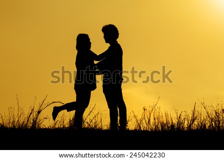 Silhouette of couple in love,Love and sensuality concept