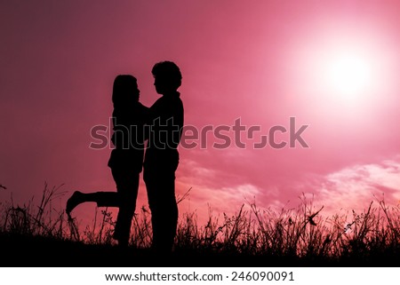 Silhouette of couple in love,Love and sensuality and valentine day concept on pink