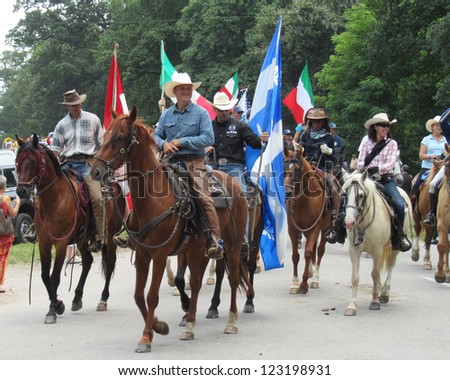 LE PIN AU HARAS, FRANCE, JULY 28: Unidentified people during the Saturday parade at \'Equirando\' on July 28th 2012 in Le Pin au Haras. It is a huge annual gathering of equestrians from all over europe.