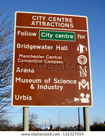 MANCHESTER, ENGLAND, JANUARY 2 :Roadsign on the A34 listing city centre tourist attractions in Manchester on January 2nd 2012. Manchester is a large industrial city in the N.W. of England.