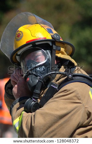 GREYMOUTH, NEW ZEALAND, FEBRUARY 6, 2007 - Fireman adjusts his breathing apparatus at a training session, February 6, 2007