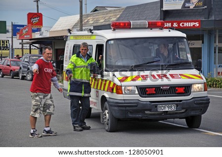 CHRISTCHURCH, NEW ZEALAND: February 26, 2011: Volunteers and fire service personnel work together after the 6.4 magnitude earthquake in Christchurch, South Island, New Zealand, 22-2-2011