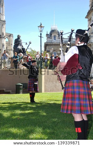 DUNEDIN, NEW ZEALAND, FEBRUARY 21: Christchurch pipe band major performs in the Octagon at the Dunedin Pipe Band competition on February 21, 2010 in Dunedin, New Zealand