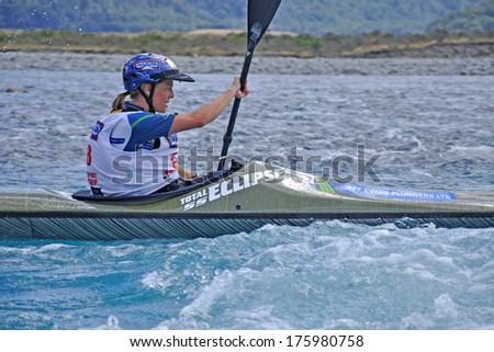 SOUTH ISLAND, NEW ZEALAND, FEBRUARY 12, 2011: Camilau Nicolau competes in the kayaking leg of the 2011 Coast to Coast triathlon, New Zealand