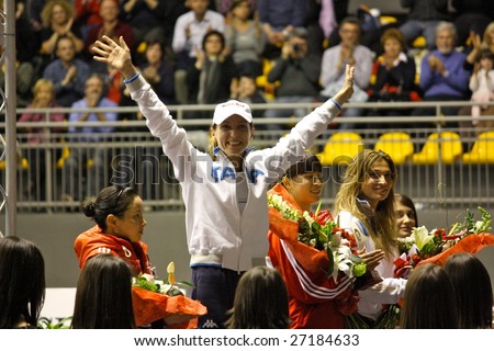 TURIN, ITALY - MARCH 22: The winner VEZZALI Valentina (ITA) on the podium at the Fencing World Cup Foil Women Senior, in Turin, Italy from the 21st to the 22nd March, 2009.