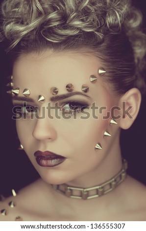 Portrait of a young girl with a spiked style fashion