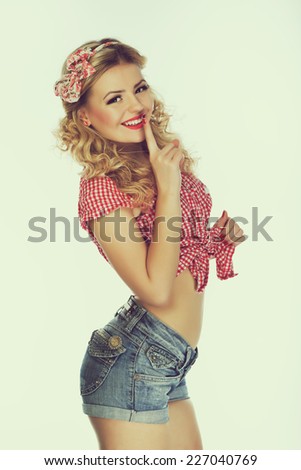Portrait of beautiful girl model in pin up