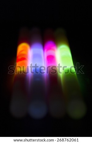 Glow sticks - Close-up of part of different colour glow stick