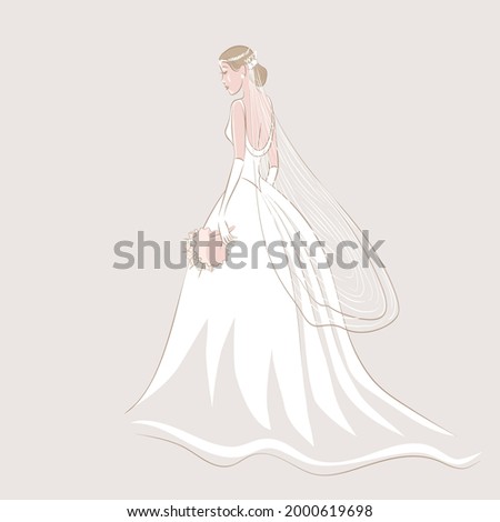 Bride in wedding dress and veil with bouquet