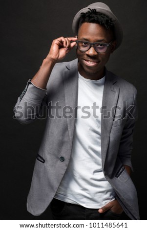 Similar – Image, Stock Photo Positive trendy black guy jumping on stairs on street