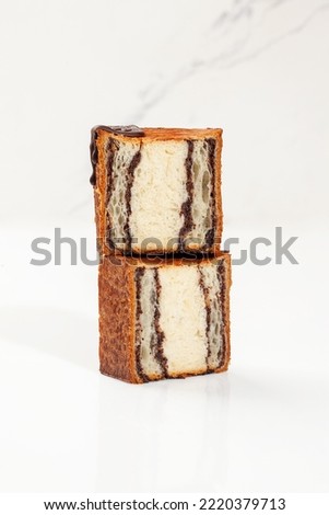 Similar – Image, Stock Photo Filling and sealing puff pastry dumplings in a kitchen