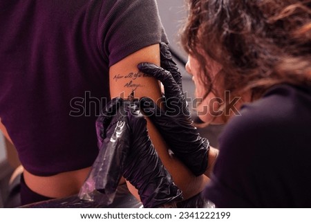 Similar – Image, Stock Photo Anonymous crop tattooist working with client in salon