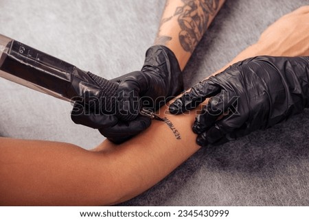 Similar – Image, Stock Photo Anonymous crop tattooist working with client in salon