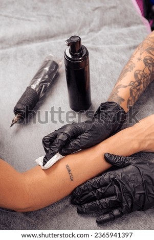 Similar – Image, Stock Photo Anonymous crop tattooist working with client in salon