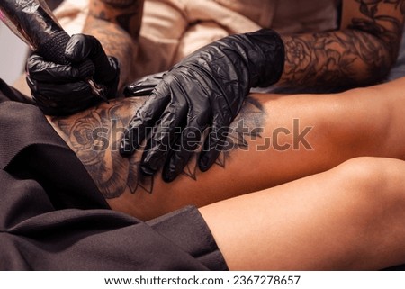 Similar – Image, Stock Photo Anonymous crop tattooist working with client in salon