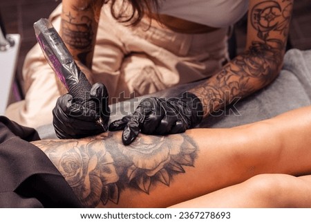 Similar – Image, Stock Photo Anonymous crop tattooist working with client in salon