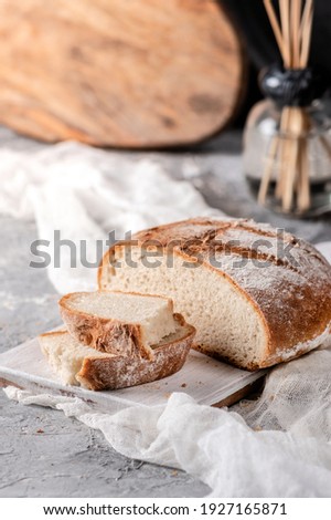 Homemade sourdough bread on rustic background