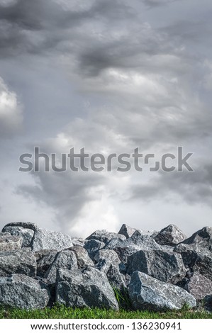 Rocky vertical landscape and unusual cloud formation.
