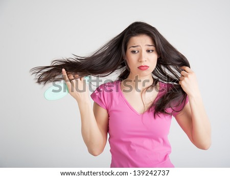 woman concerned about the condition of the hair