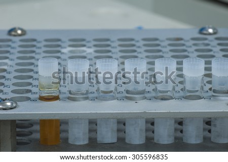 Shell type sample vial in aluminum rack ready to analysis