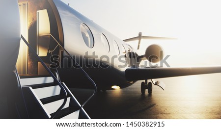 Business private jet airplane parked at terminal. Luxury tourism and business travel transportation concept. Closeup. 3d rendering Stock foto © 