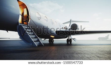 Closeup view of private jet airplane parked at outside and waiting business persons. Luxury tourism and business travel transportation concept. 3d rendering Stockfoto © 
