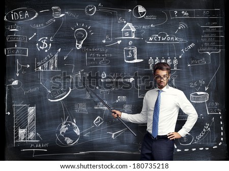 Man with pointer in his hand presenting business strategy