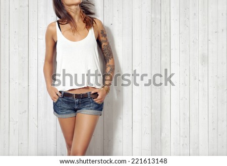 Similar – Image, Stock Photo Young tattooed woman in a wheelchair with her dog at home