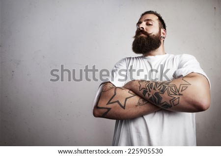 Bearded man wearing white t-shirt