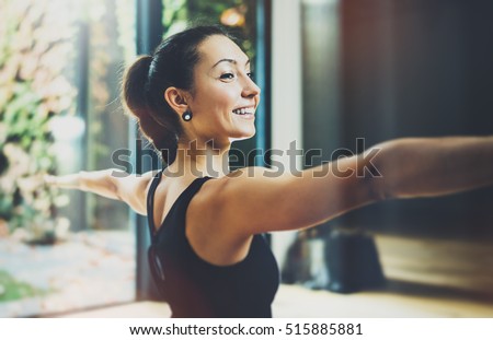 Similar – Image, Stock Photo Calm woman in Warrior pose on yoga mat