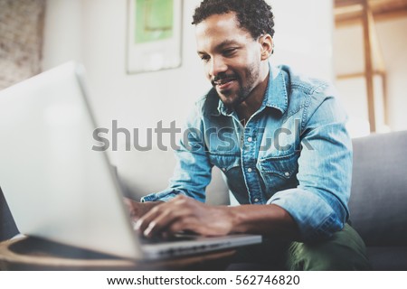 Similar – Image, Stock Photo Confident ethnic man in stylish wear in city