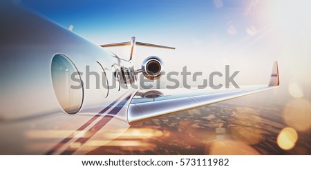 Business travel concept.Generic design of white luxury private jet flying in blue sky at sunset.Uninhabited desert mountains on the background.Horizontal,flares effect. 3D rendering. Imagine de stoc © 