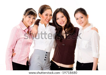 group of asian business woman in formal attire smiling