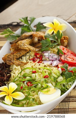Indonesian food, mie goreng ayam, fried noodle with chicken wings