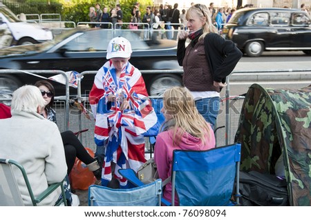 LONDON - APRIL 27: Royal family fans camp to secure a good spot at Westminster Abbey for the royal wedding celebration to take place April 29. April 27, 2011 in London, England.