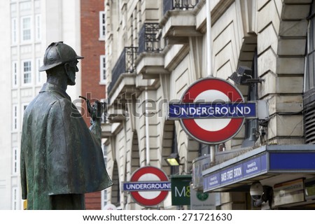 LONDON, UK - APRIL 22: Bronze statue of Sherlock Holmes in front of Baker Street station. April 22, 2015 in London. The statue was commissioned by the Sherlock Holmes Society in 1999.