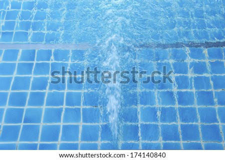 The circulation of water in the pool.