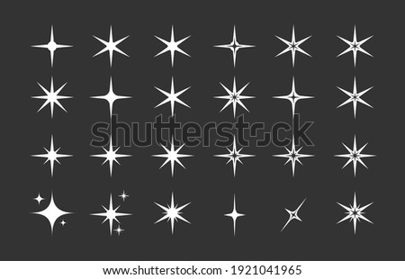Stars. A set of editable icons. The radiance of stars or fireworks. Vector icon on a black background. Flat design.