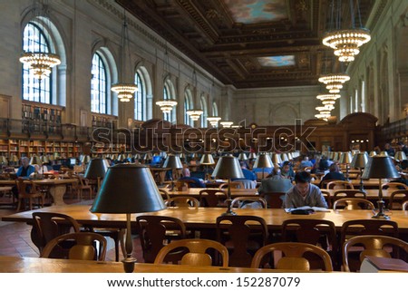 NEW YORK CITY - MAY 5: New York Public Library, the third largest public library in North America. Detail of desks and lamps on the Rose main reading room. May 5th, 2013 in Manhattan, New York City.