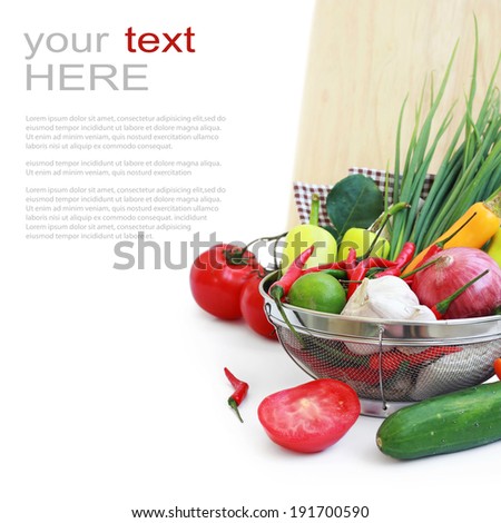 vegetables in metal colander over white (with sample text)