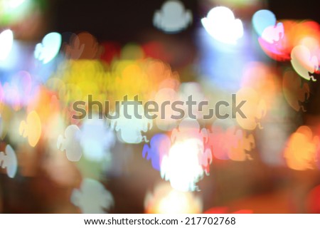 Colorful bokeh ghost halloween shape ,city at night
