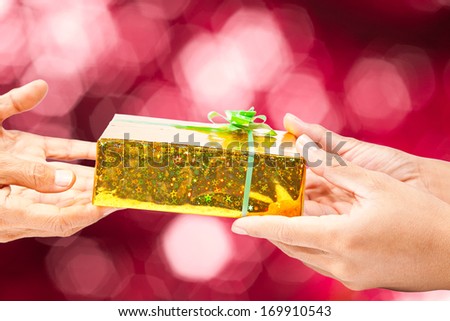 Gift giving on red background