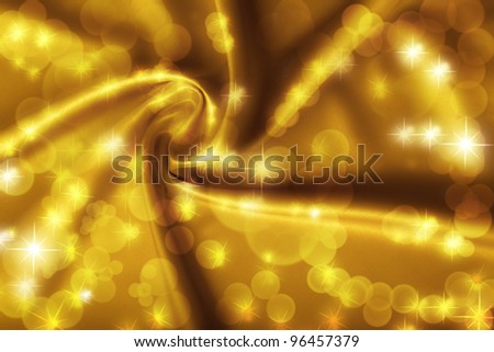 Golden satin, silk, waves, golden lights with sparkles