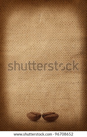 Coffee Beans on grunge background, template for menu, texture of the fabric