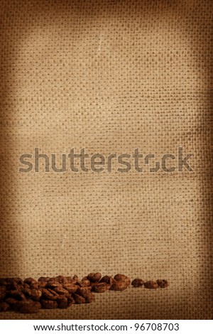 Coffee Beans on grunge background, template for menu, texture of the fabric