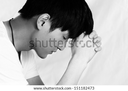 Young man supporting his head looking depressed