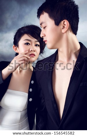 Man and woman in business suits isolated