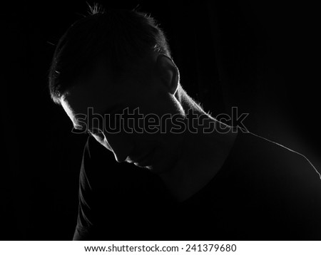 Man with hidden face. Cry or grief feeling