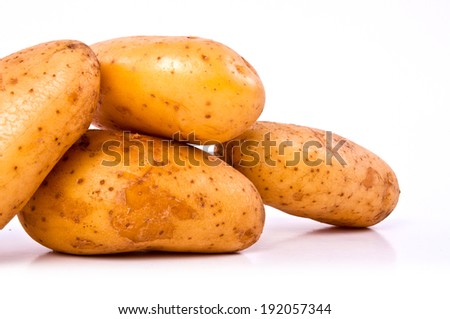 Close up Group of Fresh Organic Potato Isolated on white background. World American Popular Food.