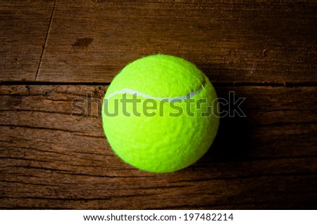 Tennis Ball on Wood Background, Sport Concept and Idea, Rustic Style.